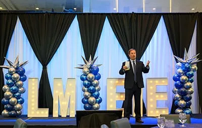 Photo of a Speaker Presentation at a Lockheed Martin Event