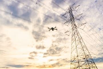 Image of a drone inspection of power lines